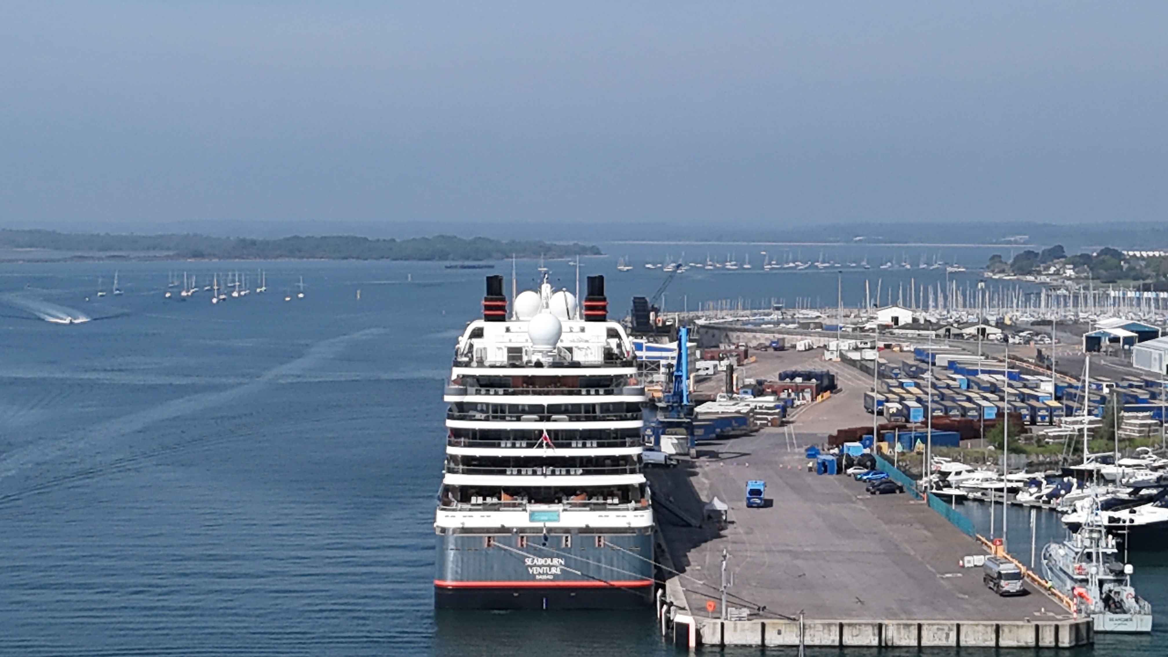 Cruise liner in port at Poole quay, showing the deep water berth and ferry terminal